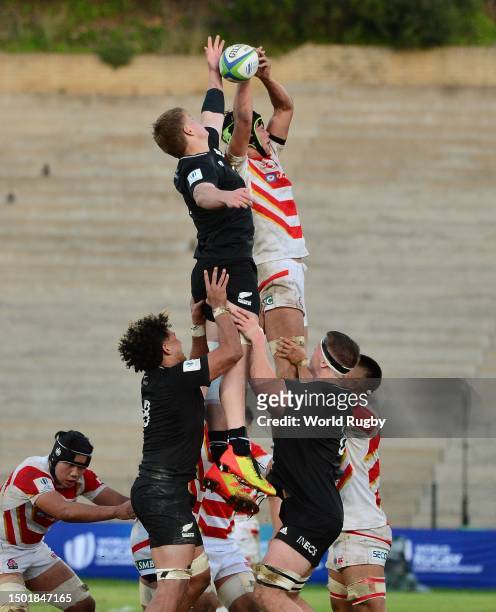 Tom Allen of New Zealand and Ryotaro Nose of Japan competes for the line out during the World Rugby U20 Championship 2023, group A match between New...