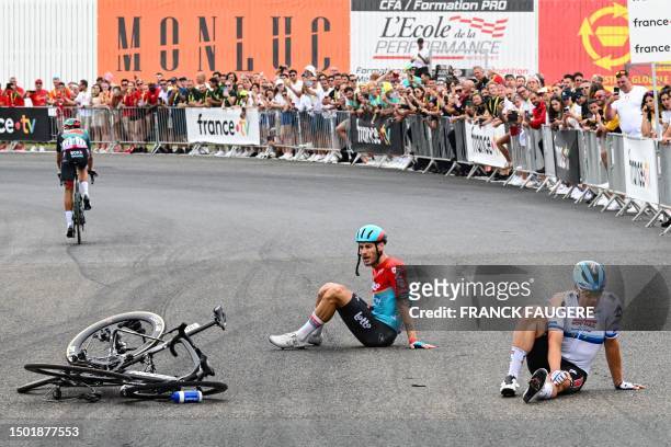Soudal Quick-Step's Dutch rider Fabio Jakobsen and Lotto Dstny's Italian rider Jacopo Guarnieri recover after crashing in the final sprint near the...