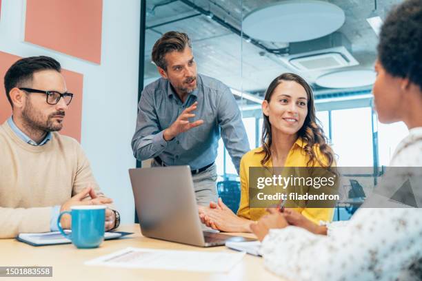 business meeting - staff meeting stock pictures, royalty-free photos & images