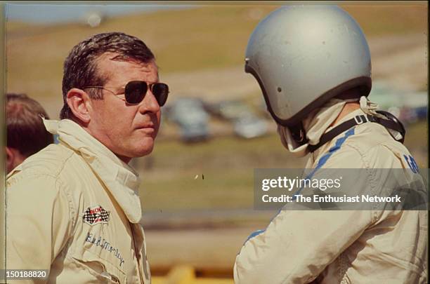 Road Racing Championships - USRRC - Laguna Seca. Bud Morley talking to other driver.