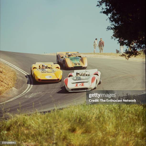 Road Racing Championships - USRRC - Laguna Seca. Bud Morley in his Lola T70 leads Bill Young also in a T70 and Moises Solana in a McLaren M6B.