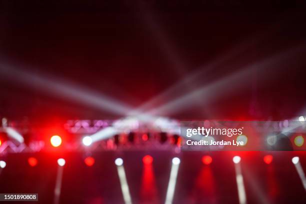 stage performing lights beam as background - stage light stock pictures, royalty-free photos & images