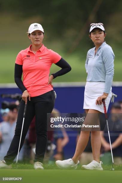 Rose Zhang of the United States and Xiyu Lin of China wait to putt on the 17th green during the final round of the KPMG Women's PGA Championship at...