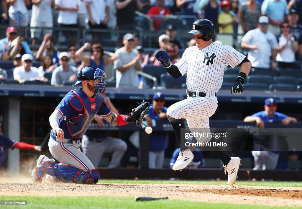 Yankees Rangers Rivalry Harrison Bader of the New York Yankees scores a run off a single by ...