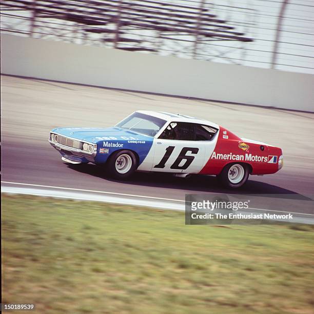 Miller 500 - NASCAR - Ontario Motor Speedway. Mark Donohue of Penske Racing driving his AMC Matador to empty grand stands. The photo was part of a...