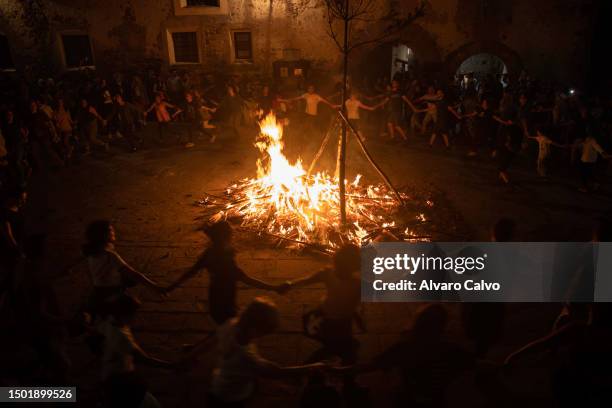 Image of the people dancing around the fire on June 24, 2023 in Bonansa, Spain. The Fallas festival in the Spanish Pyrenees is an ancient tradition...