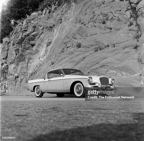 Studebaker Golden Hawk V8 in the Angeles National Forest during Hot Rod magazine test. Test crew pauses on the way to Mount Wilson observatory. Low...