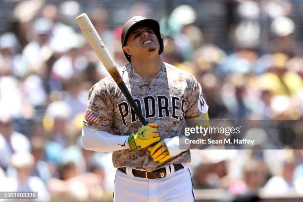 Manny Machado of the San Diego Padres reacts after striking out during the second inning of a game against the Washington Nationalsat PETCO Park on...