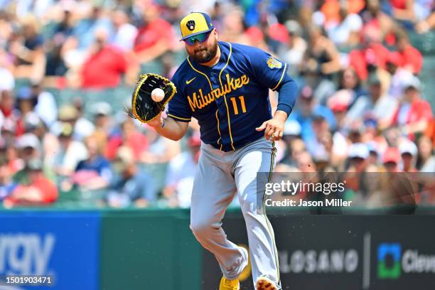 First baseman Rowdy Tellez of the Milwaukee Brewers fields a ground ball hit by Jose Ramirez of the Cleveland Guardians during the first inning at...