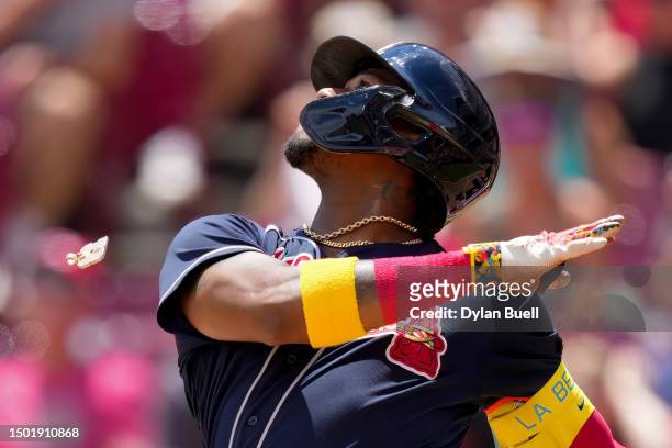 The necklace worn by Ronald Acuna Jr. #13 of the Atlanta Braves breaks as he pops out in the third inning against the Cincinnati Reds at Great...