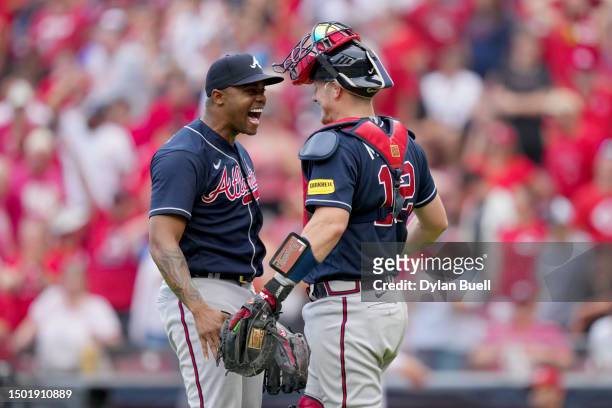 Raisel Iglesias and Sean Murphy of the Atlanta Braves celebrate after beating the Cincinnati Reds 7-6 at Great American Ball Park on June 25, 2023 in...