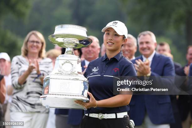 Ruoning Yin of China poses for a photo with the trophy during the awards ceremony after winning the KPMG Women's PGA Championship at Baltusrol Golf...