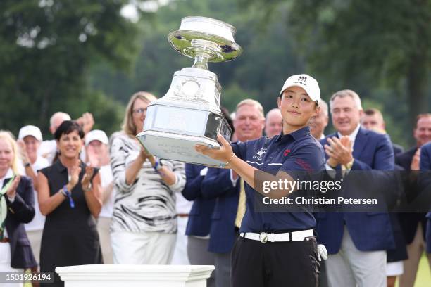 Ruoning Yin of China poses for a photo with the trophy during the awards ceremony after winning the KPMG Women's PGA Championship at Baltusrol Golf...