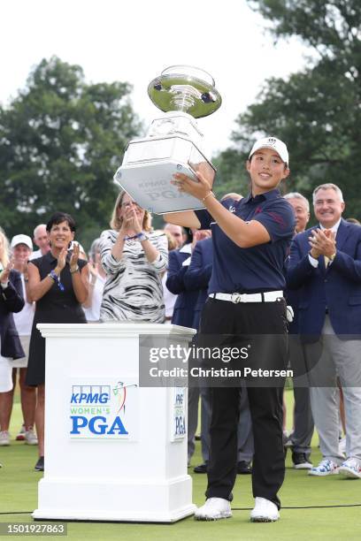 Ruoning Yin of China poses for a photo with the trophy during the awards ceremony after winning the KPMG Women's PGA Championship at Baltusrol Golf...