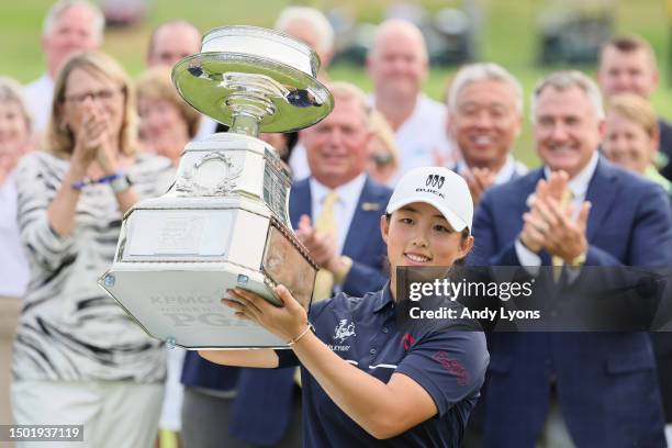 Ruoning Yin of China poses for a photo with the trophy during the awards ceremony after winning the KPMG Women's PGA Championship at Baltusrol Golf...