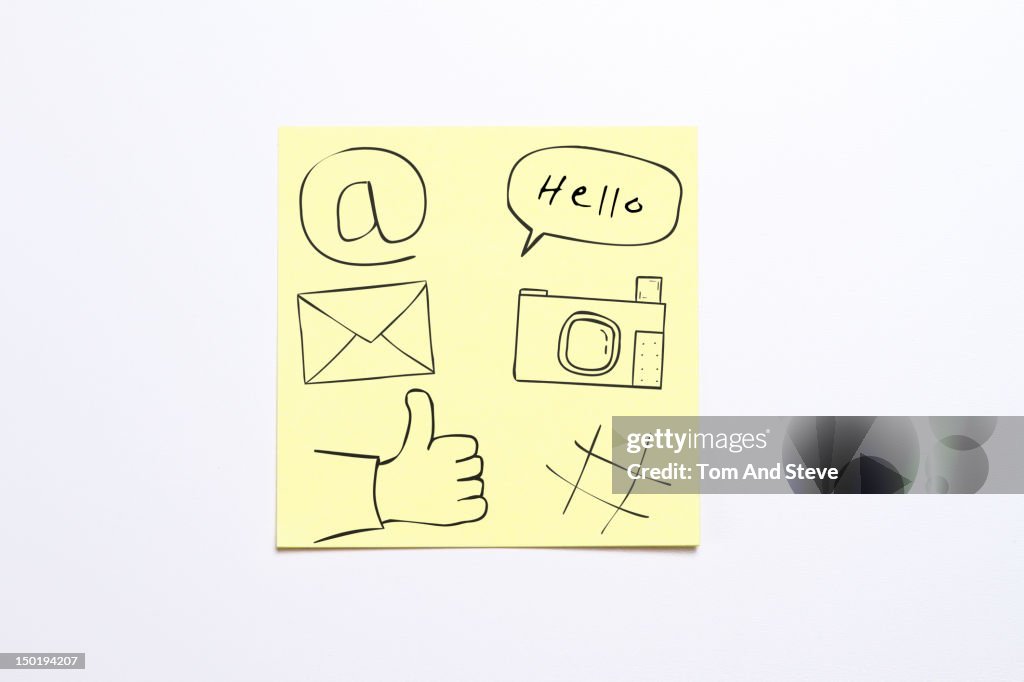 Sticky note with social media icons drawn on it