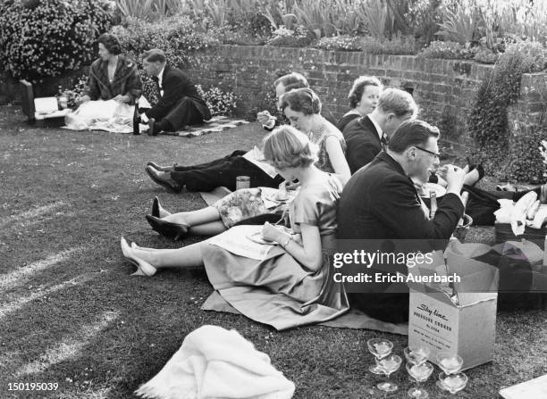 Audience members picnicking at the Glyndebourne Festival Opera, East Sussex, circa 1960.