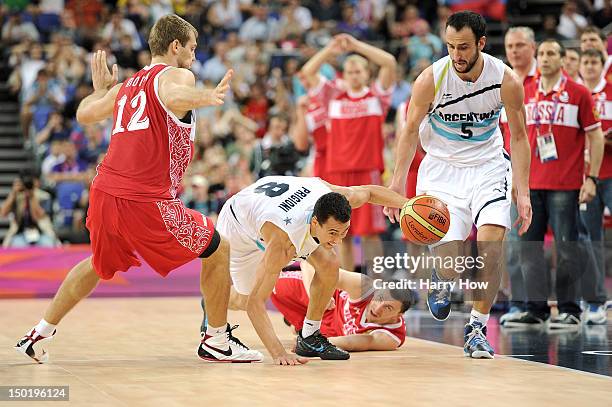 Pablo Prigioni of Argentina dribbles around Sergey Monya of Russia during the Men's Basketball bronze medal game between Russia and Argentina on Day...