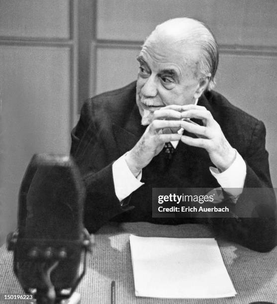 English conductor and impresario Sir Thomas Beecham in a radio studio, where he is taking part in the BBC Home Service radio series 'Frankly...