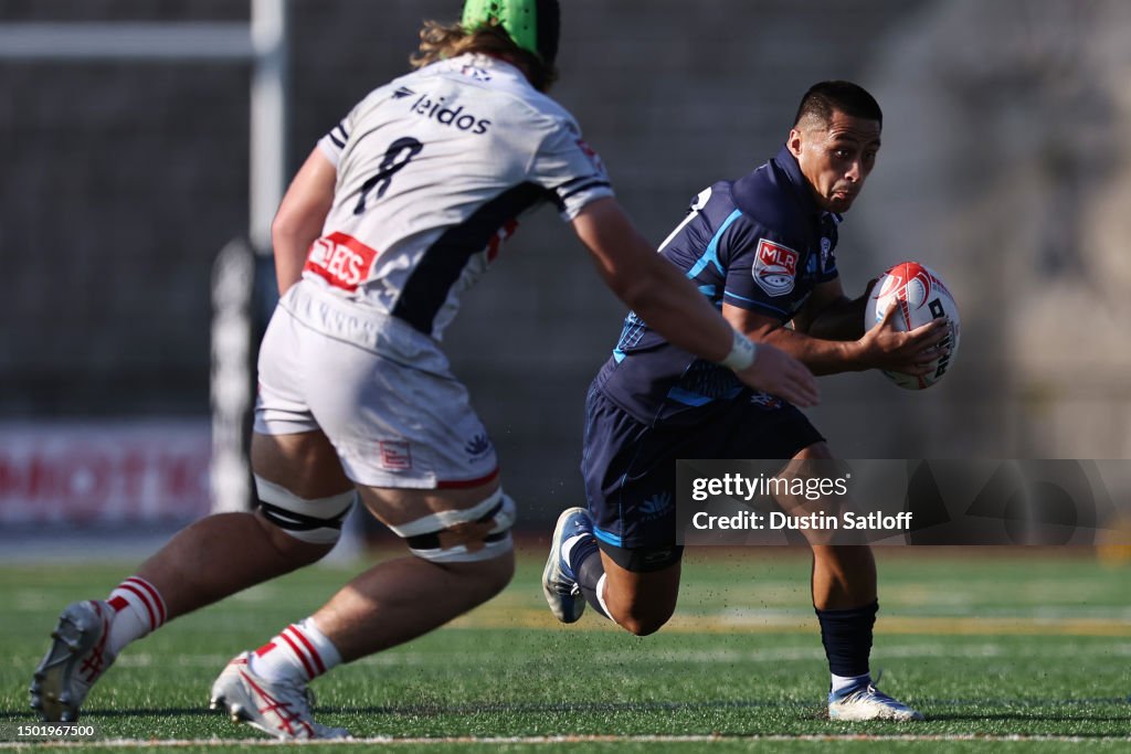 Jason R Rugby Jason Emery of Rugby New York carries the ball against Niko Jones of ...