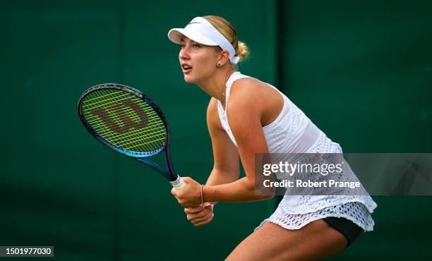 Anastasia Potapova in action against Celine Naef of Switzerland in the first round during Day Two of The Championships Wimbledon 2023 at All England...