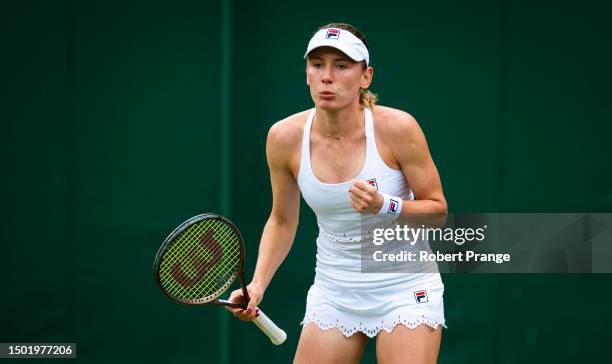 Ekaterina Alexandrova in action against Emma Navarro of the United States in the first round during Day Two of The Championships Wimbledon 2023 at...