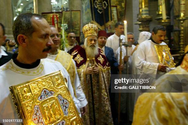 Coptic Bishop of Jerusalem Anba Abraham attends the Palm Sunday procession at the church of the Holy Sepulcher, 24 April 2005, in Jerusalem's Old...