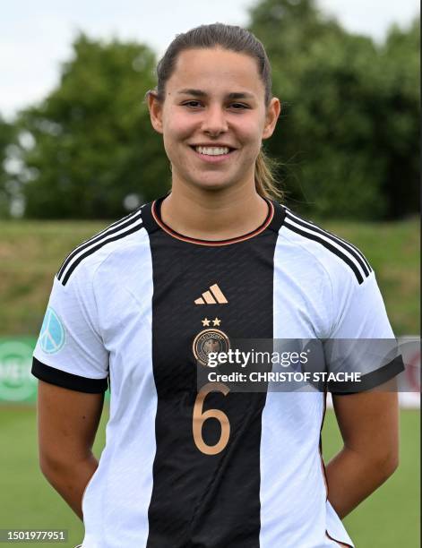 Germany's midfielder Lena Oberdorf poses for a photo at the preparation camp of Germany's national football team in Herzogenaurach, southern Germany,...