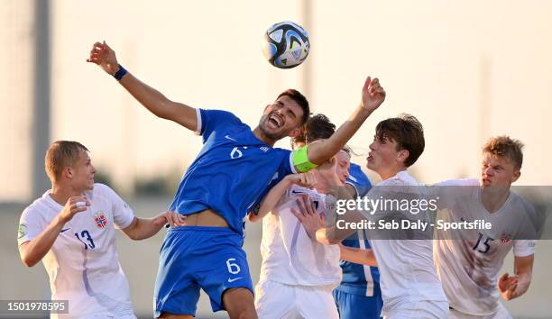 Alexios Kalogeropoulos of Greece challenges for the ball alongside Norway players, from left, Aleksander Andresen, Heine Gikling Bruseth and Nikolai...