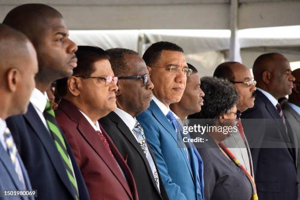 Jamaica Prime Minister Andrew Holness stands among other CARICOM leaders at the Convention Centre in Chaguaramas, Trinidad and Tobago, on July 4,...