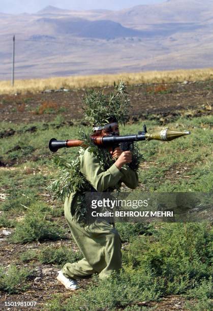 Iraqi Kurd women Peshmerga prepares to fire a Rocket-Propelled Grenade during a military training at the general command base in Suleimaniya, a city...