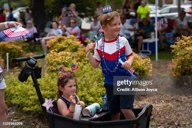 Residents participate in the annual Independence Day Parade on July 4, 2023 in Southport, North Carolina. The U.S. Declaration of Independence was...