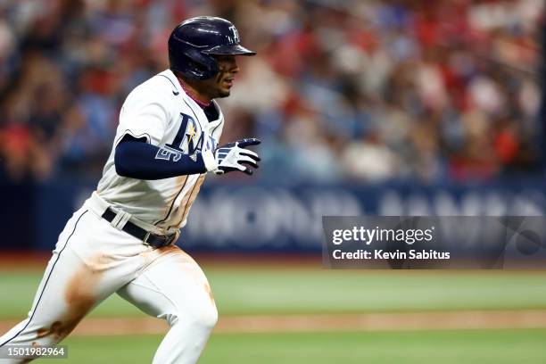 Wander Franco of the Tampa Bay Rays hits a solo home run during the eighth inning against the Philadelphia Phillies at Tropicana Field on July 4,...