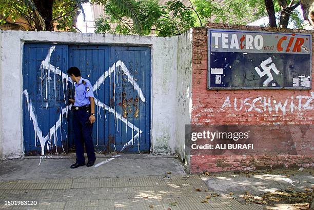 Policeman closes the gate of the Ramos Mejia Cultural and Sports Centre, belonging to the Jewish-Progresist Federation in Buenos Aires, 04 February...