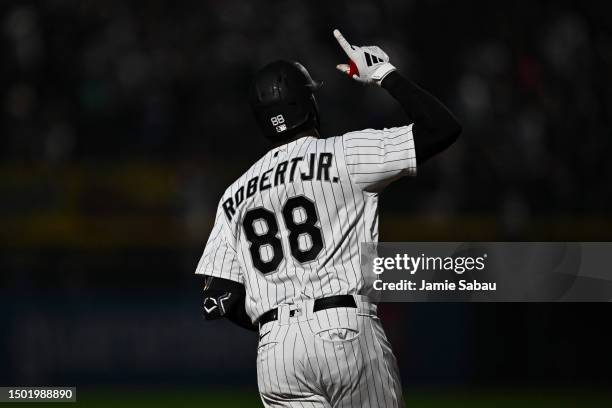 Luis Robert Jr. #88 of the Chicago White Sox celebrates while rounding the bases after hitting a three-run home run in the sixth inning against the...