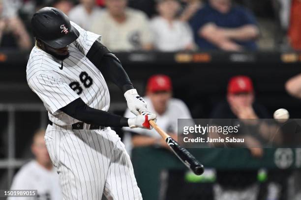 Luis Robert Jr. #88 of the Chicago White Sox hits a three-run home run in the sixth inning against the Toronto Blue Jays at Guaranteed Rate Field on...