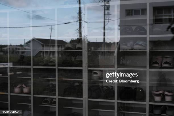 Shoe rack inside a disused hospital in Futaba, Fukushima Prefecture, Japan, on Tuesday, July 4, 2023. Japanese utility Tepco is planning...