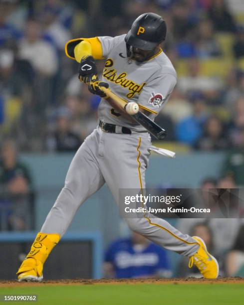 Josh Palacios of the Pittsburgh Pirates hits a two-RBI double in the ninth inning against the Los Angeles Dodgers at Dodger Stadium on July 4, 2023...