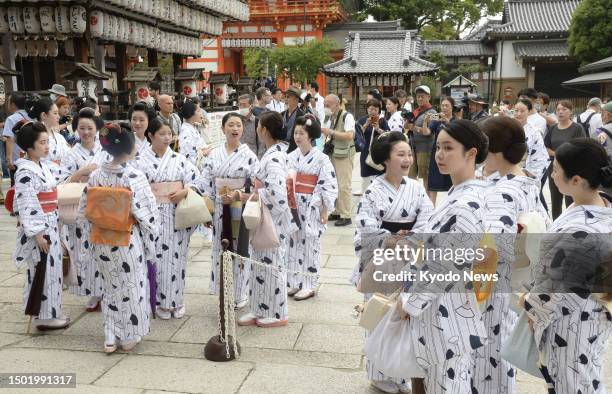 Wearing "yukata" summer kimonos, Geiko and Maiko visit Yasaka shrine in Kyoto on July 5 to pray for health and improvement in their performances.