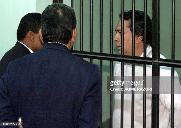 Panamanian Pacifico Castrillon waits the start of his new trial on terrorism, in Lima, for his alleged involvement with the MRTA 22 November 2002, in...