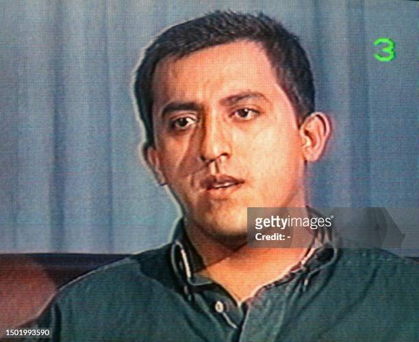 In this photo taken from a Cuban television broadcast 15 September, Salvadoran national Raul Ernesto Cruz Leon speaks about his alleged involvement...