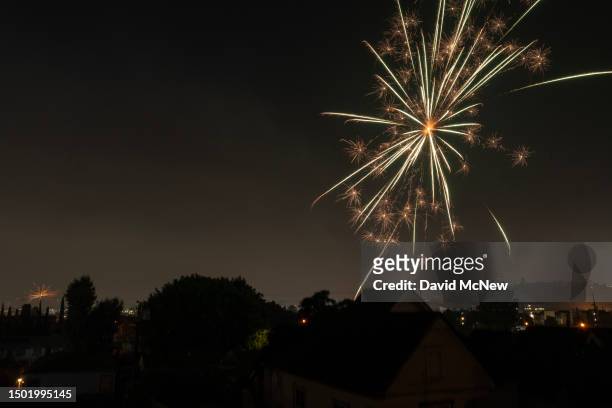 In an aerial view, illegal fireworks by the many thousands are set off across the city on July 4, 2023 in Los Angeles, California. Although setting...