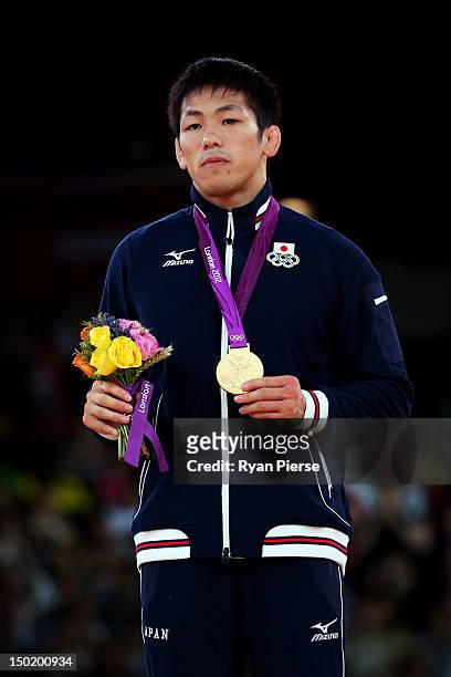Tatsuhiro Yonemitsu of Japan celebrates with his gold medal during the medal ceremony following the Men's Freestyle 66 kg Wrestling gold medal fight...