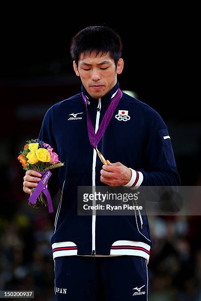 Tatsuhiro Yonemitsu of Japan celebrates with his gold medal during the medal ceremony following the Men's Freestyle 66 kg Wrestling gold medal fight...