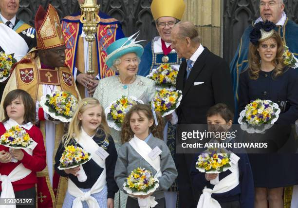 Britain's Queen Elizabeth II , stands with Archbishop of York John Sentamu , Prince Philip, Duke of Edinburgh and Princess Beatrice of York as she...
