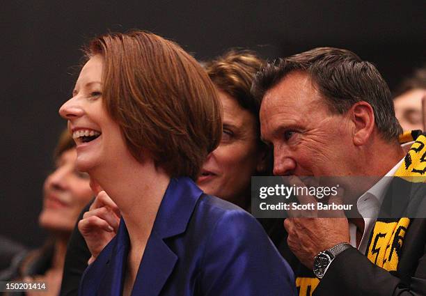 Australian Prime Minister Julia Gillard and her partner Tim Mathieson look on during the launch of the Korin Gamadji Institute at the ME Bank Centre...