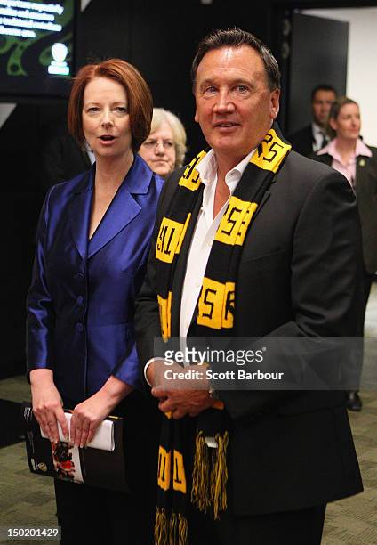 Australian Prime Minister Julia Gillard and her partner Tim Mathieson look on during the launch of the Korin Gamadji Institute at the ME Bank Centre...