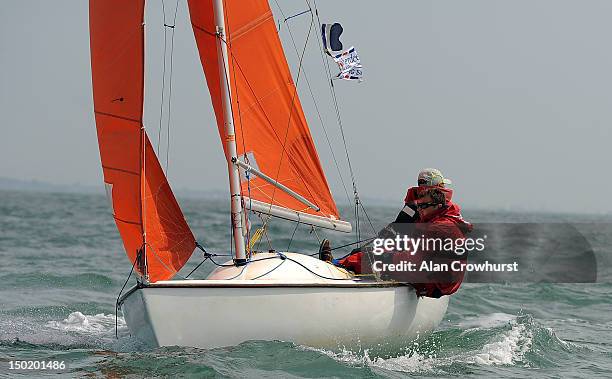 Ben Gibson and brother Chris race Whizzard in the Squib class and the U25 Sailing Trophy during day two of the Aberdeen Asset Management Cowes Week...