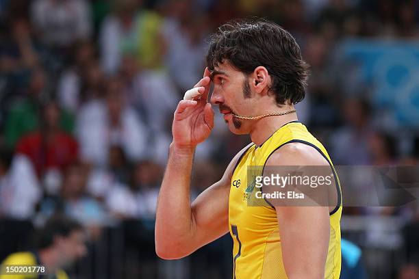 Gilberto Godoy Filho of Brazil reacts against Russia during the Men's Volleyball gold medal match on Day 16 of the London 2012 Olympic Games at Earls...