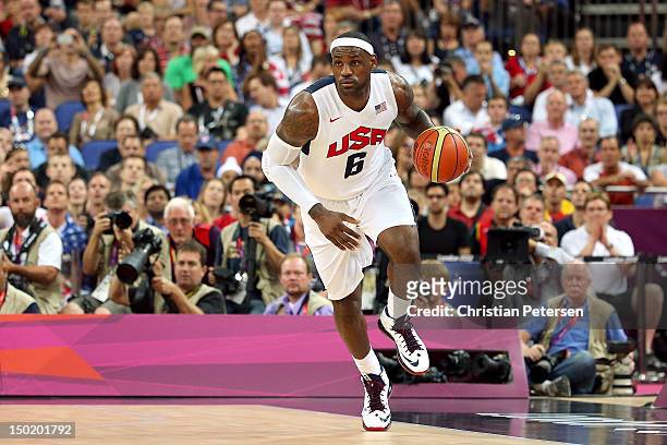 LeBron James of the United States dribbles the ball during the Men's Basketball gold medal game between the United States and Spain on Day 16 of the...